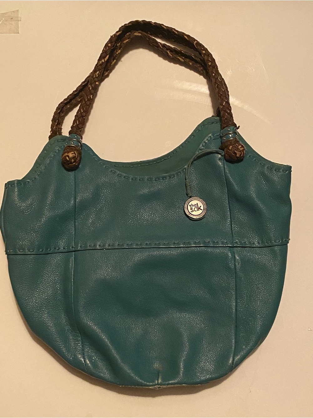 The Sak Teal Leather Shoulder Bag with Braided Brown Handles